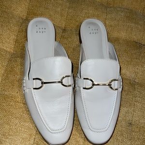 A new day, white, size 8 1/2